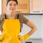 woman looking ready to clean her kitchen