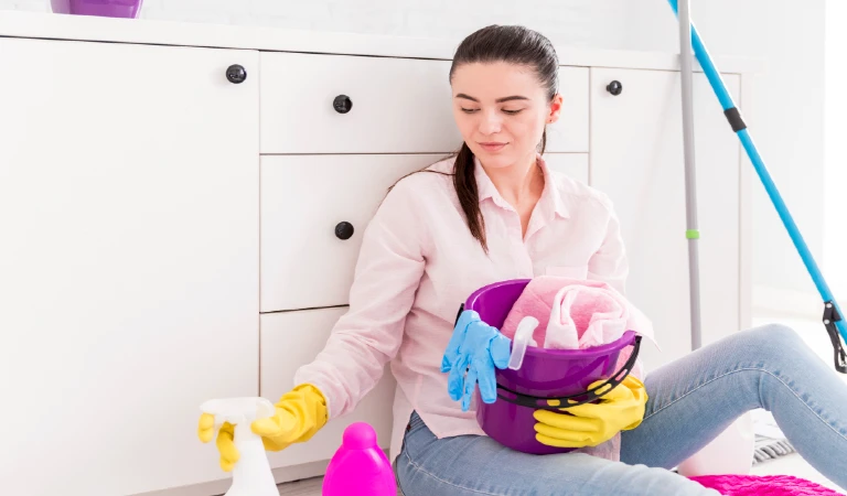 Woman cleaning home