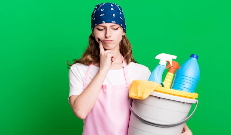 Caucasian pretty blonde woman housekeeper and clean products concept